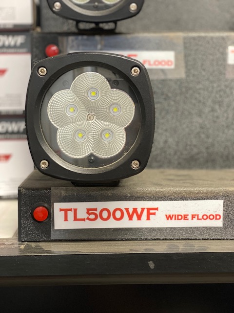 TL500WF wide flood LED light on a display shelf
