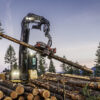 Log Max 10000XT processor processing a log on a job site