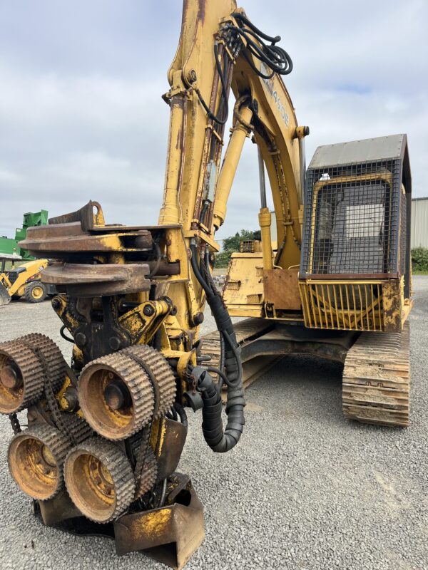 John Deere 490E Excavator with processor head