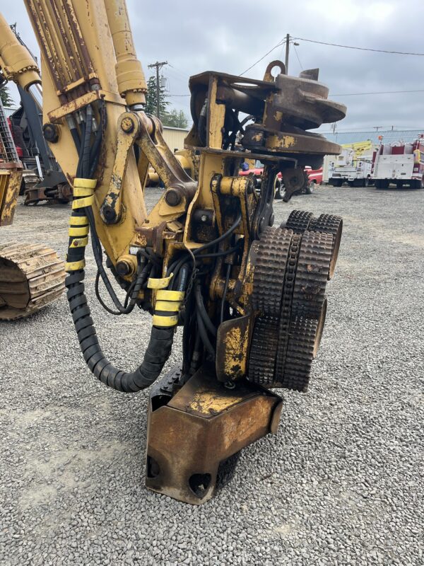 John Deere 490E Excavator with processor head