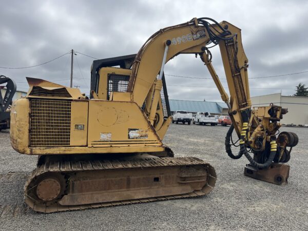 John Deere 490E Excavator with processor head