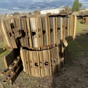 Used JD 2954 tracks for sale at Precision Machinery in Eugene, OR