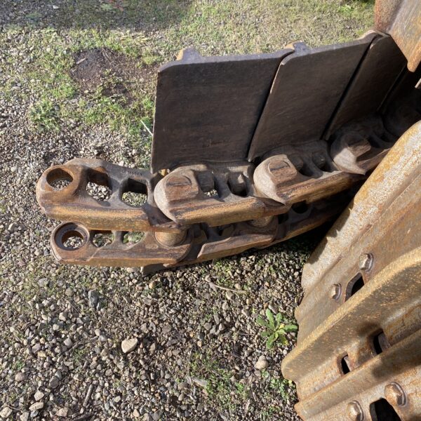 Used JD 2954 tracks for sale at Precision Machinery in Eugene, OR